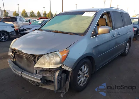 2010 Honda Odyssey Ex z USA, uszkodzony, nr VIN 5FNRL3H47AB020272